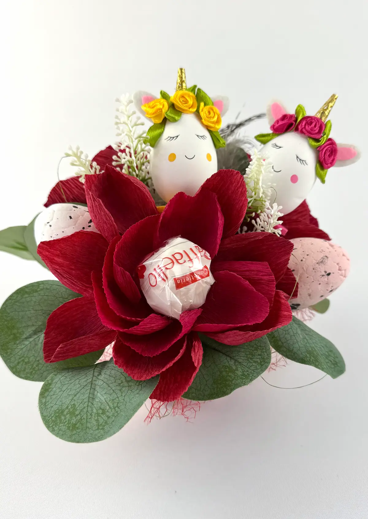Dark Red Flower Arrangement with Raffaello inside